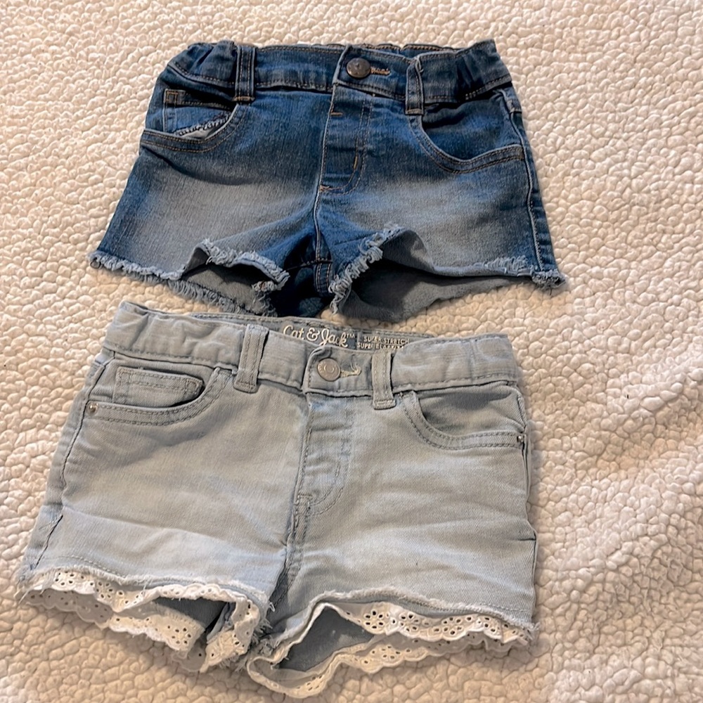 Two pairs of toddler shorts. Cat & Jack, and Garanimals.